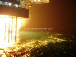 Rig flaring, pumping operations. Persian Gulf