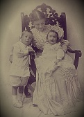 Marguerite Stewart Conant Withey sits with son Lewis Hinsdill, my Grandfather, on her lap and son Thurber Conant standing. Photo date October 1905